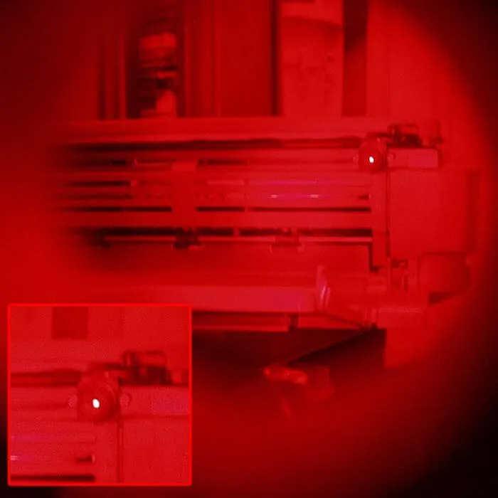 Palm-sized Infrared scanner for hidden camera lens reflections